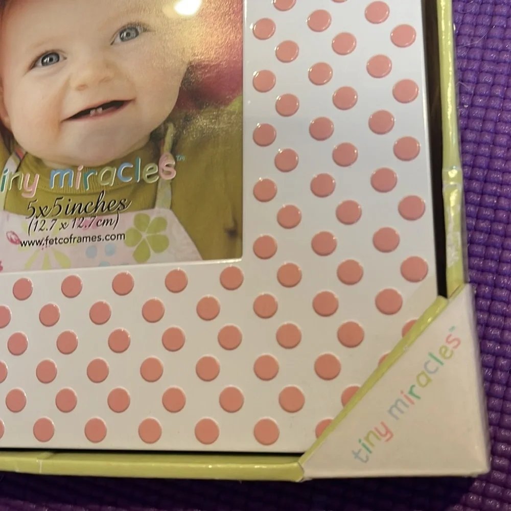 Picture frame. Holds 5 x 5 photo. Brand new.